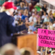 A Donald Trump supporter holds up a sign as the Republican presidential candidate speaks during a rally Aug. 21, 2015, in Mobile, Ala.
Mark Wallheiser/Getty Images